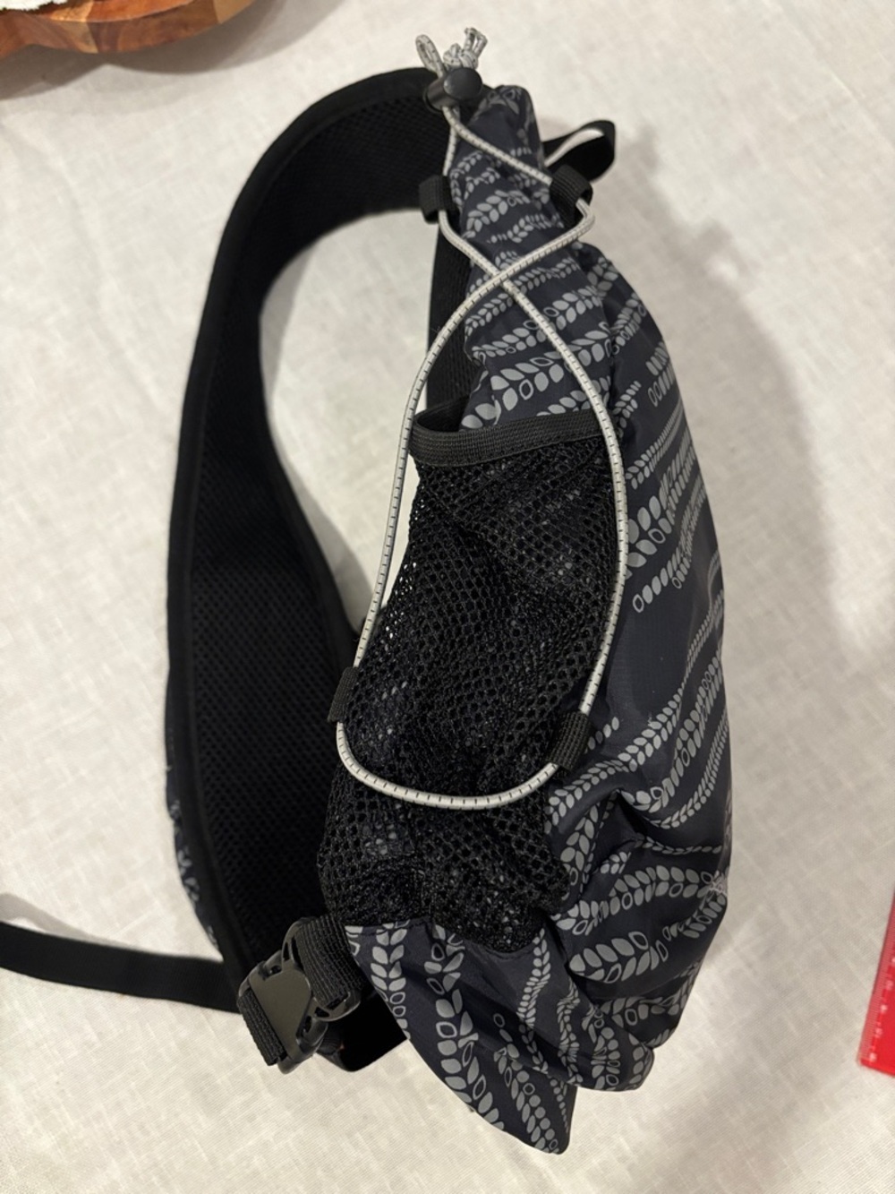 Eddie Bauer Black and Gray Patterned Sling Backpack - Picture 6 of 11